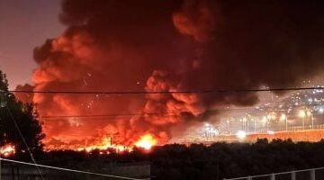 مستوطنون يضرمون النيران في مستودع للسيارات في حوارة جنوب نابلس